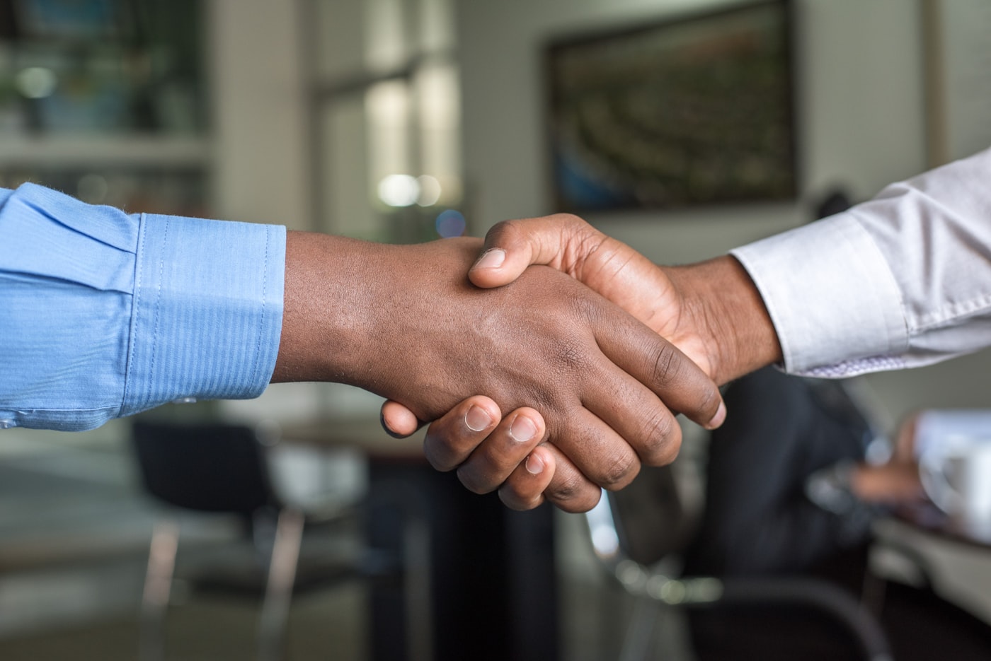Business owners discussing a confidential sale